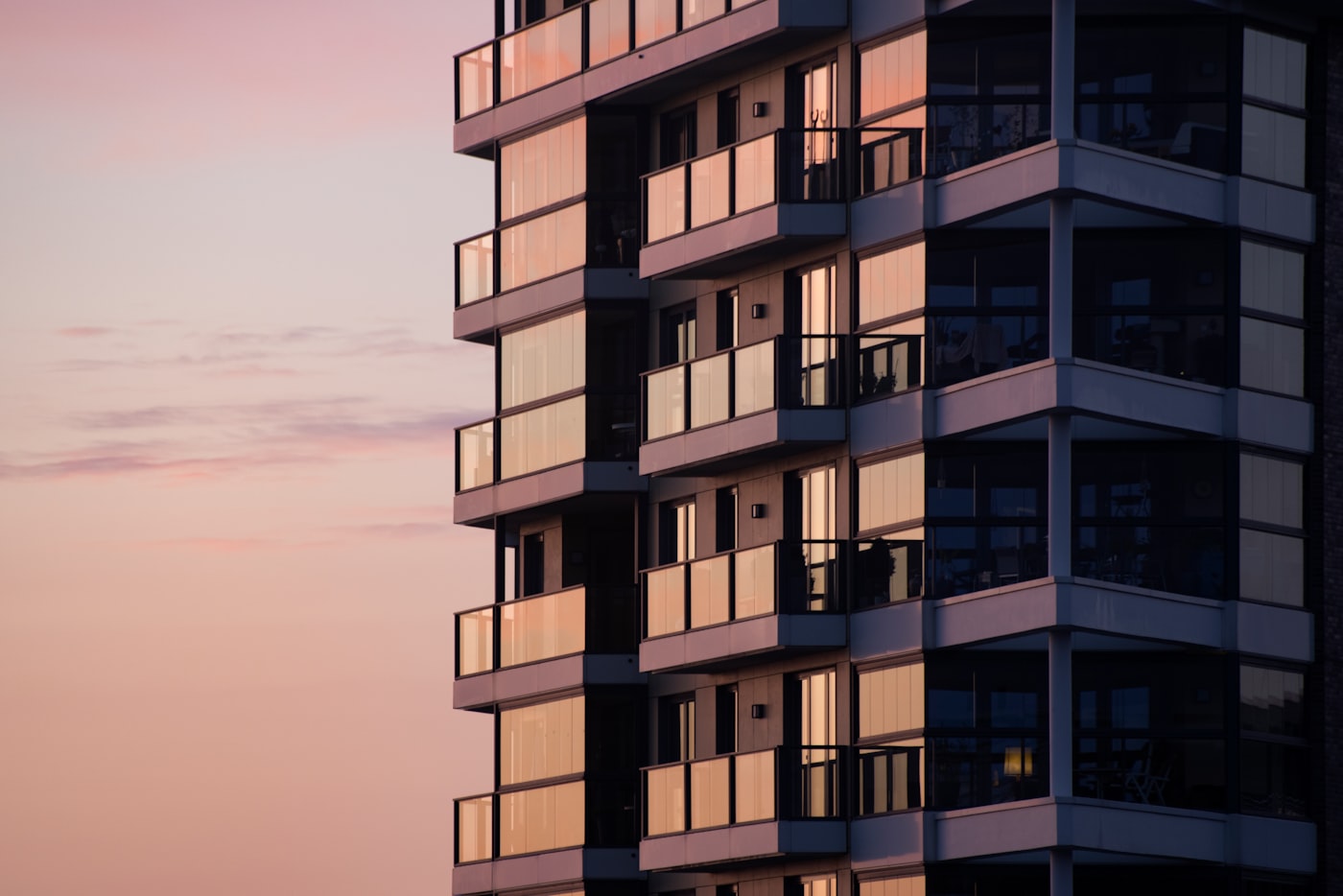 Modern residential building reflecting the sky